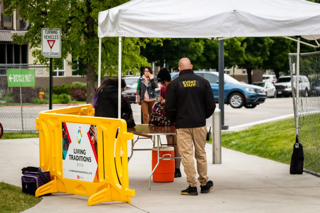 yellow crowd barriers in use at entrance living traditions festival slc 2019 1024x682 jpg