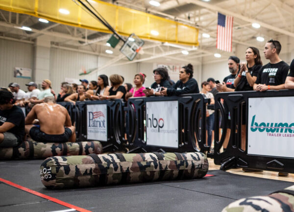 Barricades with custom signage at Metcon Rush