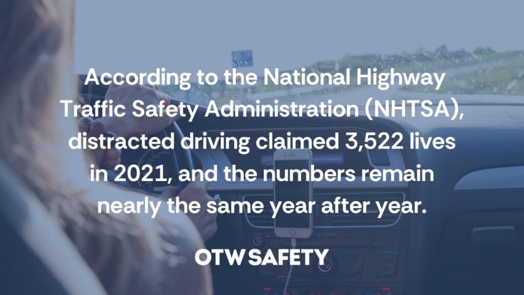 Text on image reads: According to the National Highway Traffic Safety Administration (NHTSA), distracted driving claimed 3,522 lives in 2021, and the numbers remain nearly the same year after year. The background image is tinted blue and features the back of a woman's head who is driving a car.