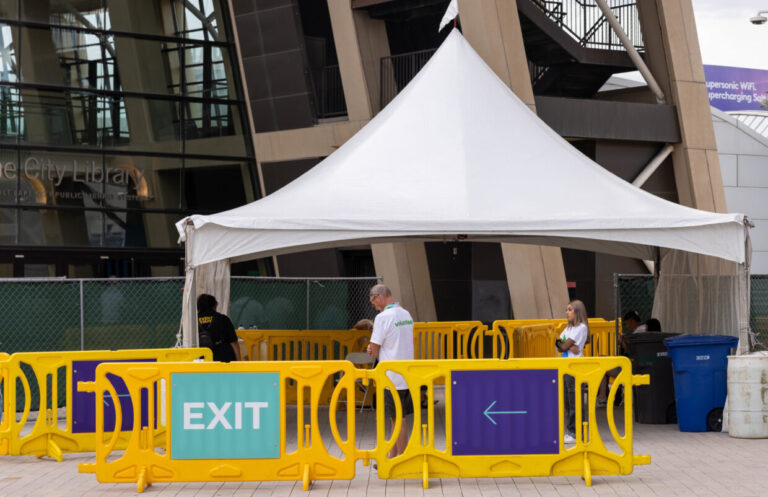 Yellow barricades at entrance of festival
