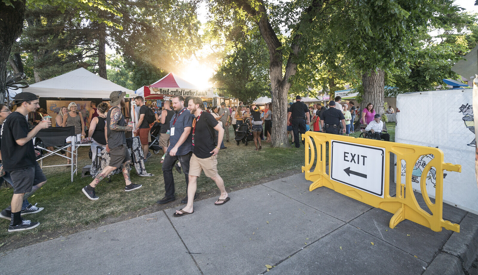 Utah Arts Festival uses a yellow OTW crowd control barricades as exit signage