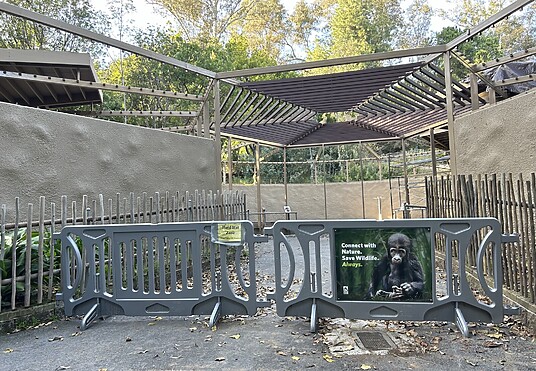 Two green zoo barricades at LA Zoo