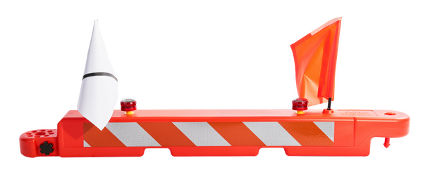 An orange and white 10" low profile airport barricade faces front with an airport hazard barricade light on each side, left and right. An orange aiport barricade hazard flag and a white airport barricade hazard flag are connected to the barricade on top.