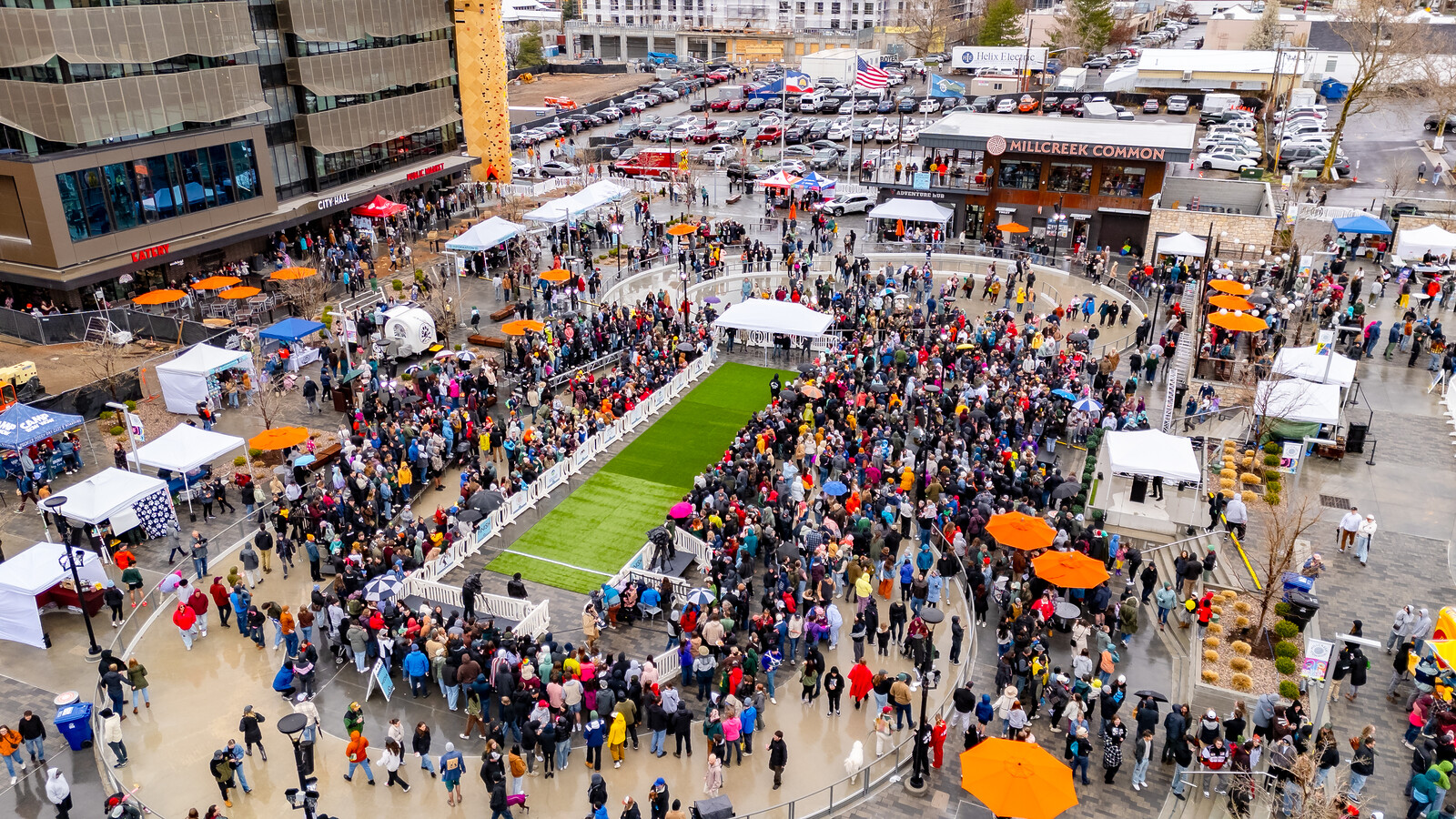 Aerial view of the Doxie Derby event with OTW Safety billboard barricades surrounding the race track for crowd control