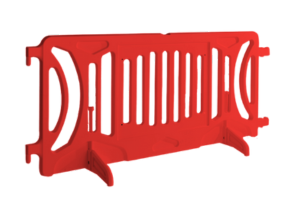 Red plastic crowd control barricade with vertical slots, sturdy feet, and integrated billboard panel, manufactured by OTW Safety.