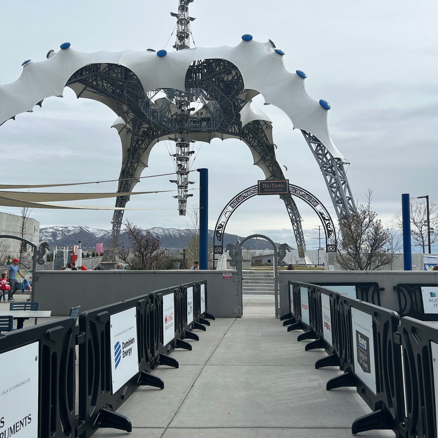 black OTW Safety billboard barricades with custom sponsor signs lining the entrance at Utah's aquarium for a fundraising gala to support Autism Solutions Academy