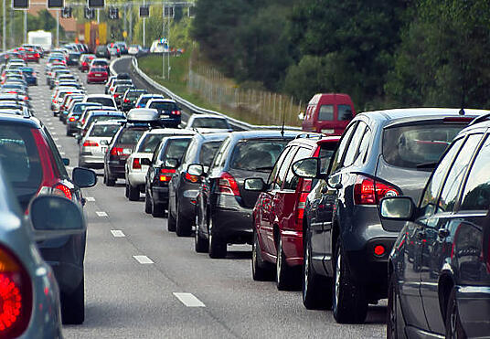 Heavy rush hour traffic backed up on a multi-lane roadway