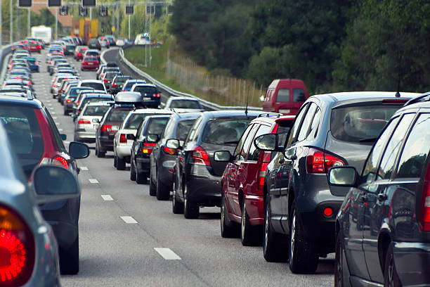 Heavy rush hour traffic backed up on a multi-lane roadway